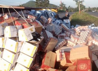 Party delayed - Yongyuth Srimawong escaped serious injury when his beer truck overturned, but the same can’t be said for his amber cargo.